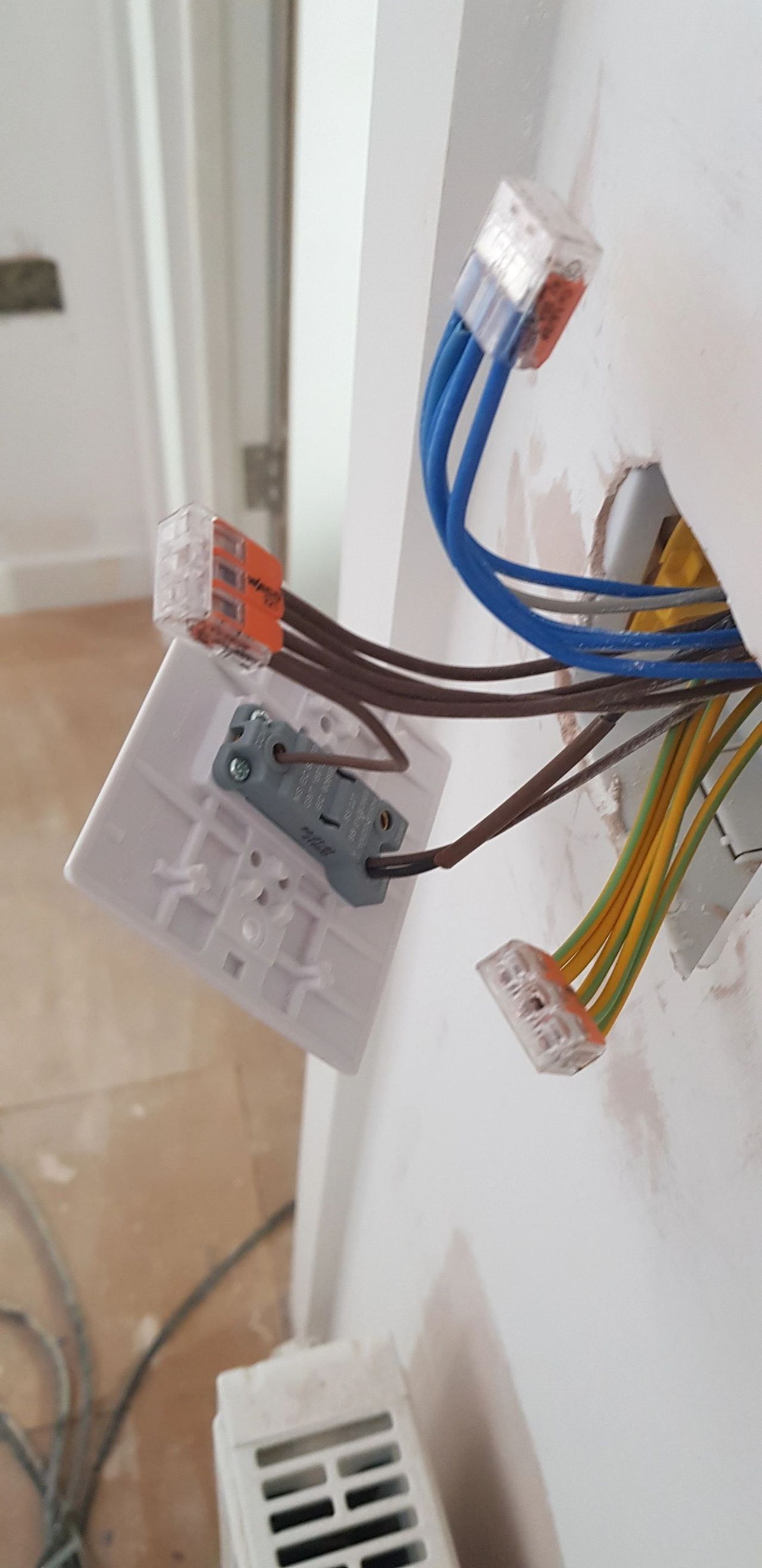 Close-up of consumer unit wiring with push-fit connectors